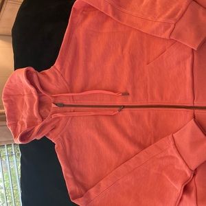 NWT peach hoodie sweater. Bought but never wore it was to big on me.
